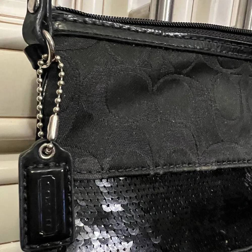 coach signature large flat sequin wristlet bag